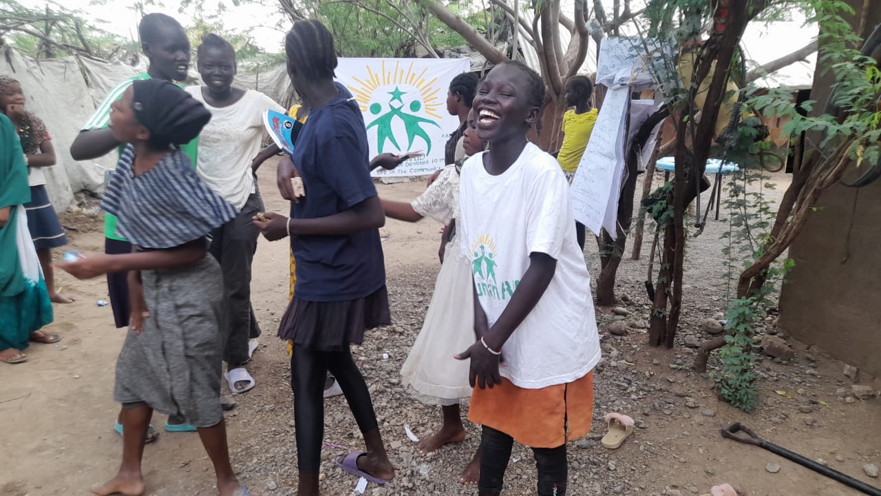 The image is Refugee-led organization Stress-free Zone for Children GBV, MHM, FGM Prevention Healing Through Art Hygiene & Sanitation