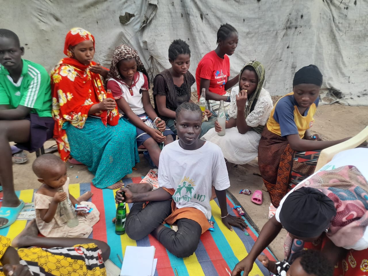 The image is Refugee-led organization Stress-free Zone for Children GBV, MHM, FGM Prevention Healing Through Art Hygiene & Sanitation